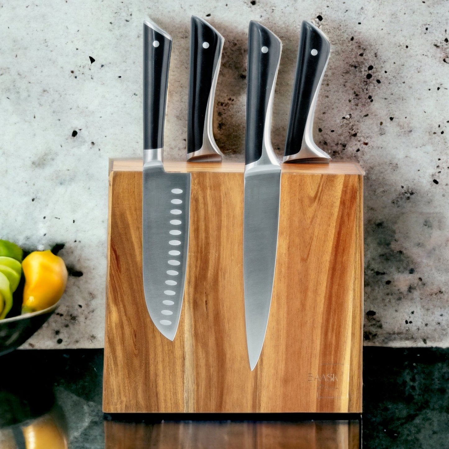 magnetic knife block double sided holding chef knives on dark marble kitchen bench and grey background